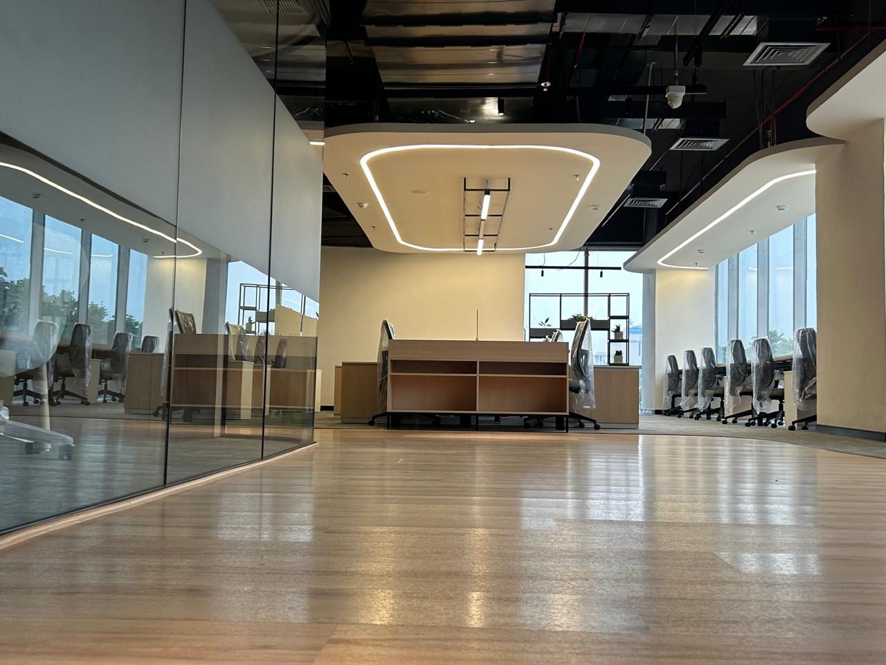 Glass-partitioned workstation area with visible hardware detailing